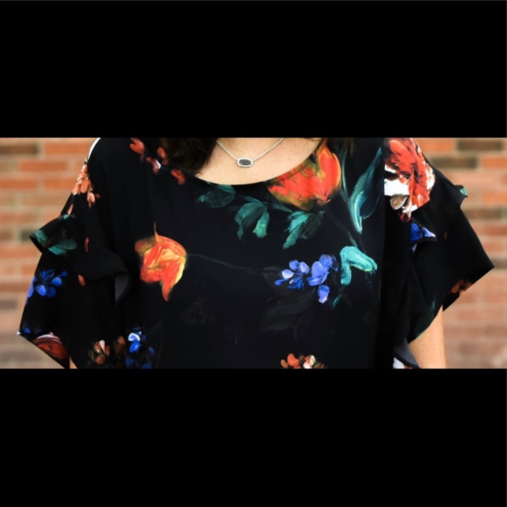 Express black top detailed with painted flowers